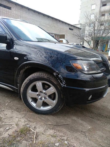 Правый "банан" бампера Mitsubishi Outlander  2006 2.0 Бензин Хмельницкий