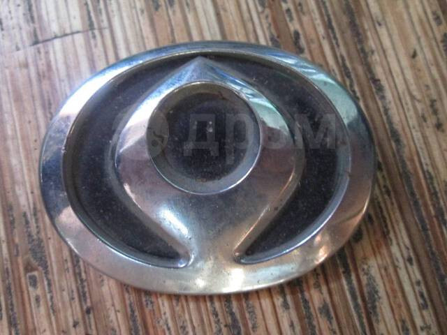 Эмблема решетки радиатора Mazda 626  1992 2.0 Бензин Краматорск