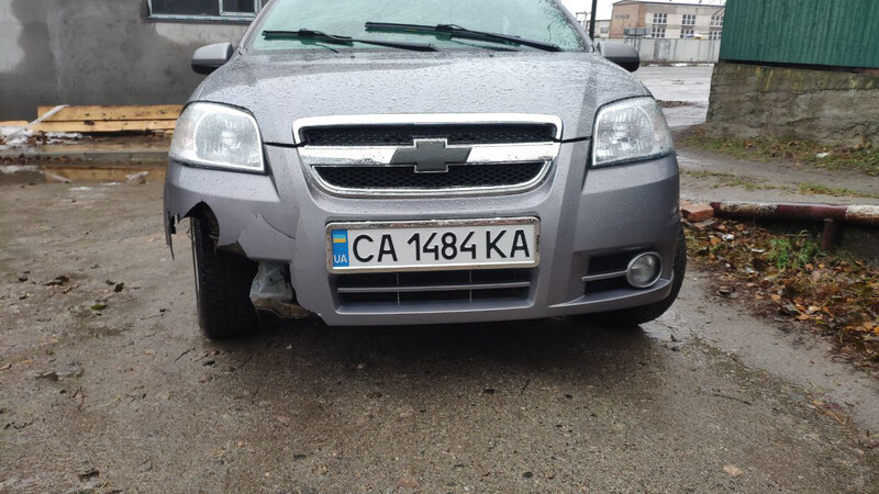 Бампер передний в сборе с решетками Chevrolet Aveo  2011 1.5 Бензин Корсунь-Шевченковский