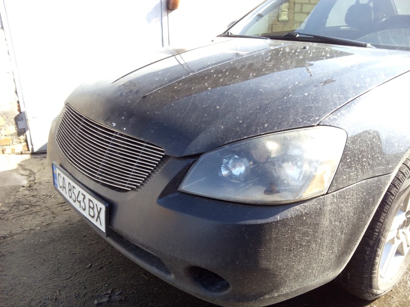 Бампер и декоративная решётка Nissan Altima  2004 2.5 Бензин 