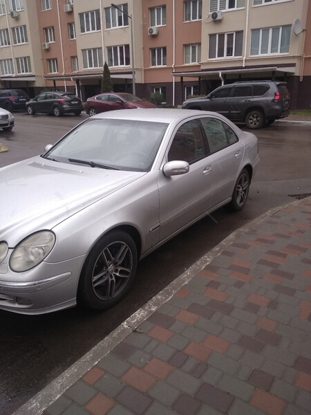 Крыло переднее левое Mercedes E-Class 2002 г.  2.7 л дизель Вишневое