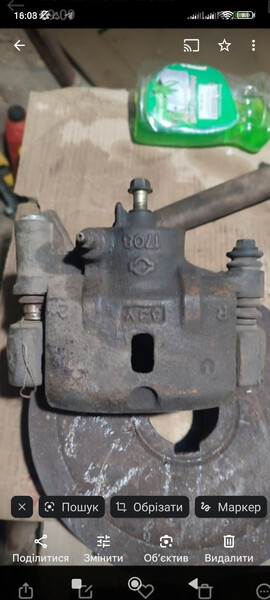 Передній правий супорт Nissan Sunny B12  1988 універсал 1.6 Бензин Оржиця