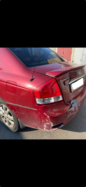 Задний бампер (с отверстиями под противотуманные фары) Kia Cerato  2008 2.0 Бензин Киев