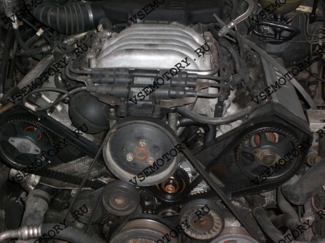 Кронштейн ролика поддержуещего поликлинового ремня Audi 100 C4  1993 2.8 Бензин 