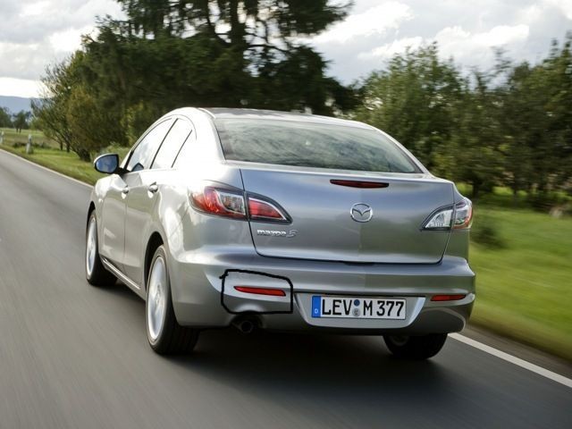 Задний левий светоотражатель на бампере Mazda 3 BL  2012 1.6 Бензин Киев