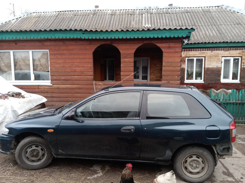 Бампер задний Mazda 323  1999 хэтчбек 1.6 Бензин Хмельницкий