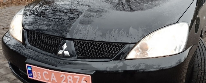 Решетка радиатора Mitsubishi Lancer 2008 г.  1.6 л бензин Кривой Рог