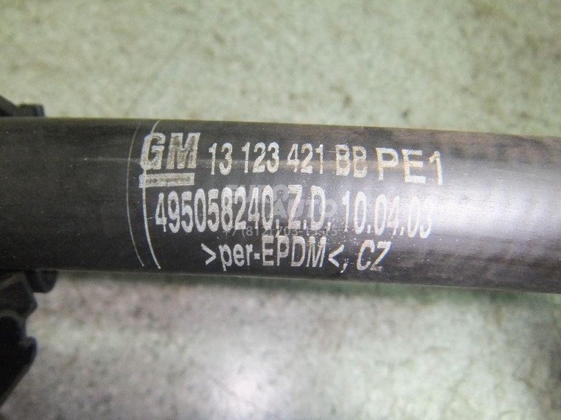 Патрубок системы охлаждения 13123421   Opel Astra