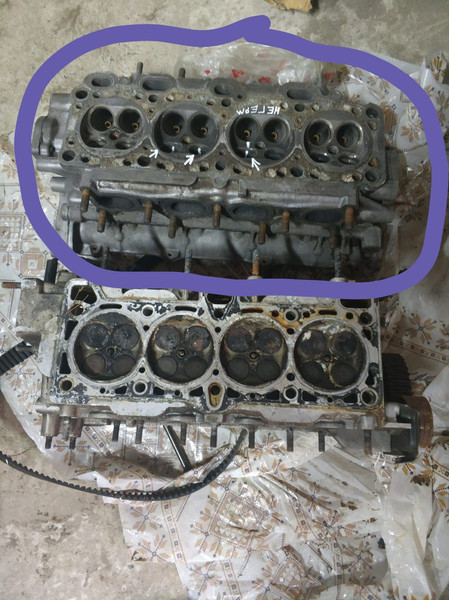 Головка цилиндров 0K01310100A   Kia Carens, Kia Sportage