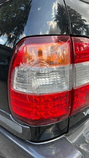 Фонарь задний левый 8156160671   Toyota Land Cruiser