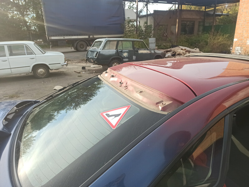 Задний спойлер Mazda 323  1997 1.5 Бензин Винница