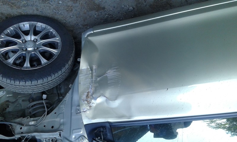 Двері передні 67001-52400   Toyota Yaris