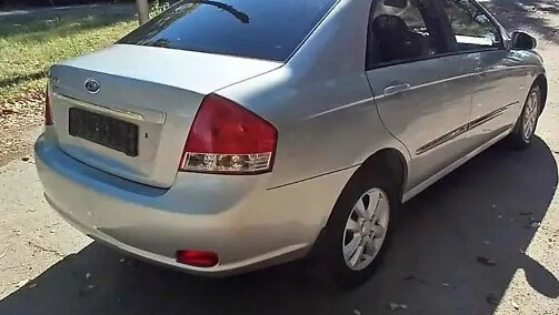 Бампер задний Kia Cerato 2007 г.  1.6 л бензин