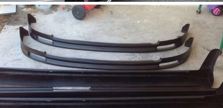 Губа переднього бампера Mazda 323  1996 хетчбек 