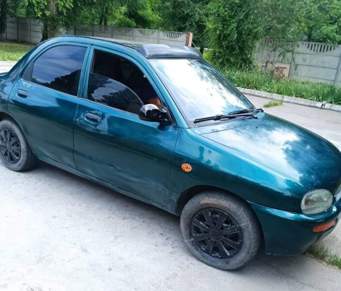 Капот Mazda 121 1991 г.