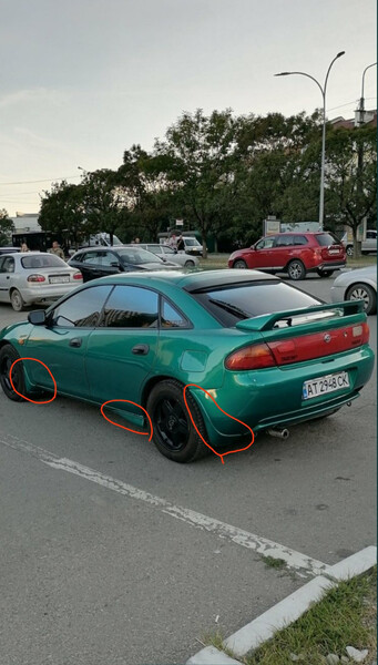 Бризковики задні Mazda 323  1998 хетчбек 1.5 Бензин 