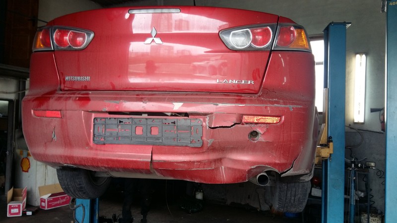 Бампер задний Mitsubishi Lancer X  2011 2.0 Бензин Киев