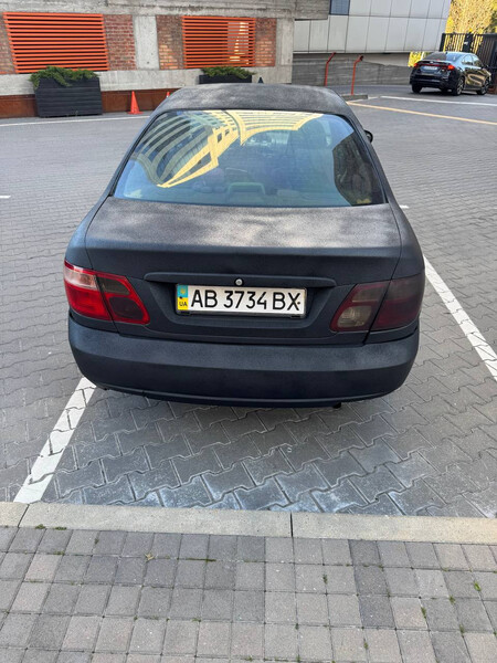 Бампер задній 85022BN800   Nissan Almera