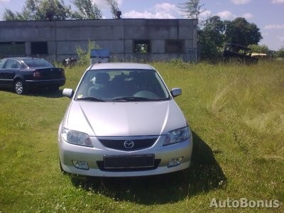 Передняя левая противотуманная фара Mazda 323 F 2002 хетчбек 2.0 Бензин 