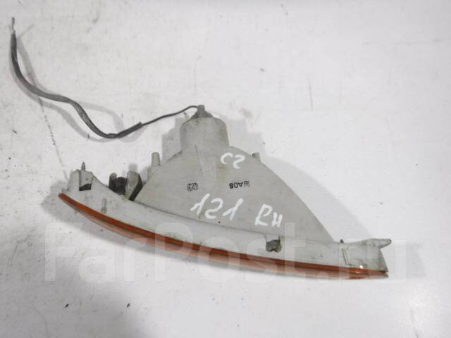 Поворотник Mazda 121  1991 1.3 Бензин 