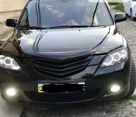 Решетка, капота Mazda 3 BK хэтчбек 2005 г.  2.0 л бензин Желтые Воды