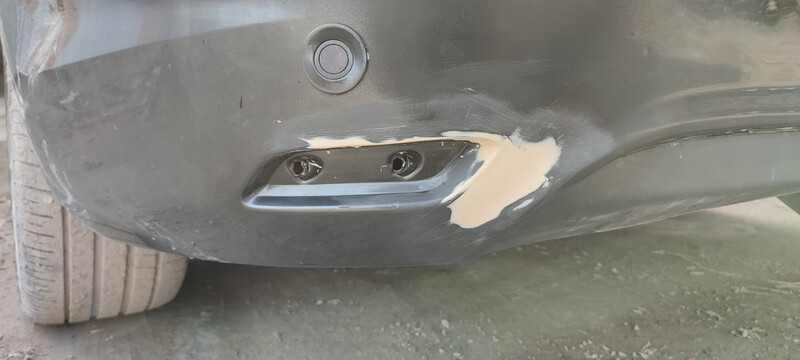 Отражатель (катафот) заднього бампера лівий Ford Focus  2010 універсал 1.6 Дизель 