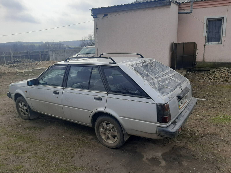 Стекло ляды Nissan Sunny B12  1986 универсал 1.7 Бензин Хмельницкий