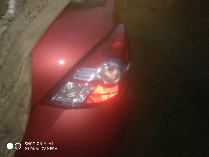 Фонарь лев Nissan Tiida C11  2010 хетчбек 1.6 Бензин 