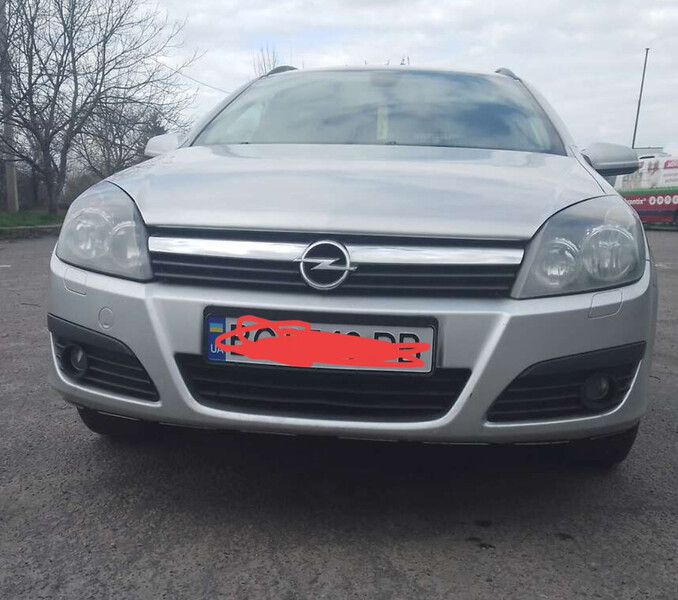 Бампер передний Opel Astra H 2005 универсал  Электро 