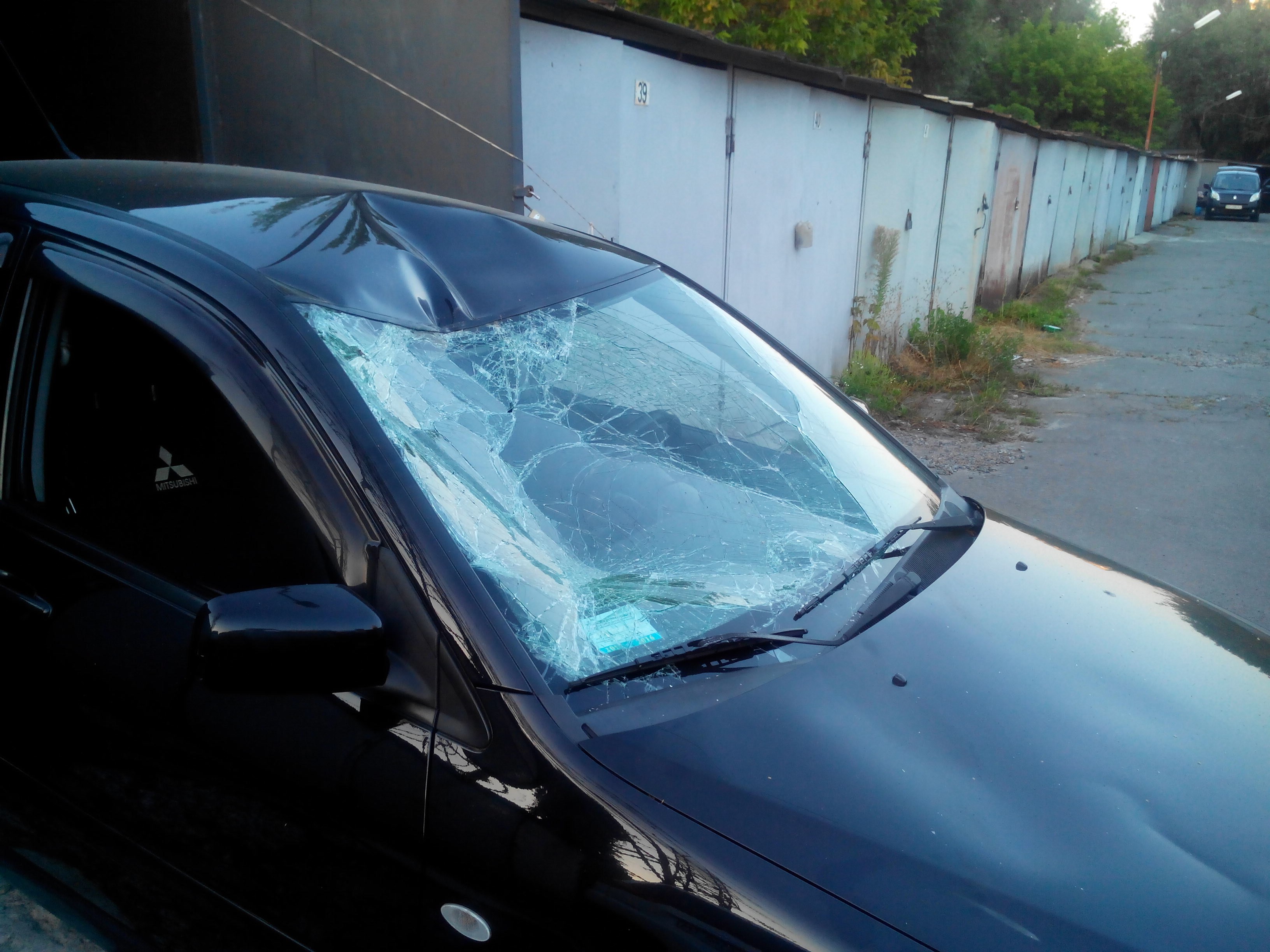 Стекло лобовое MR991631   Mitsubishi Lancer