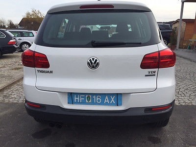 Буквы на крышке багажника. Volkswagen Tiguan  2012 Николаев