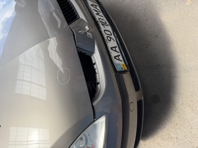 Решетка бампера Mitsubishi Colt  2008 2.0 Дизель Белая Церковь