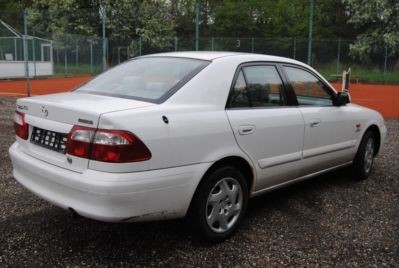 Фонарь задний правый наружный, рестайловый Mazda 626  2001 2.0 Бензин Киев