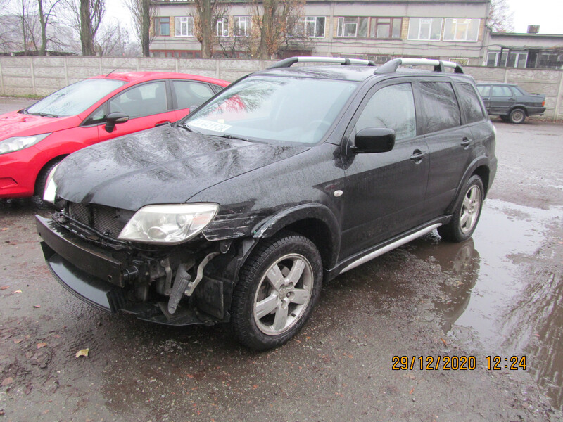 Фара передняя левая Mitsubishi Outlander 2007 г.  2.4 л бензин Бровары