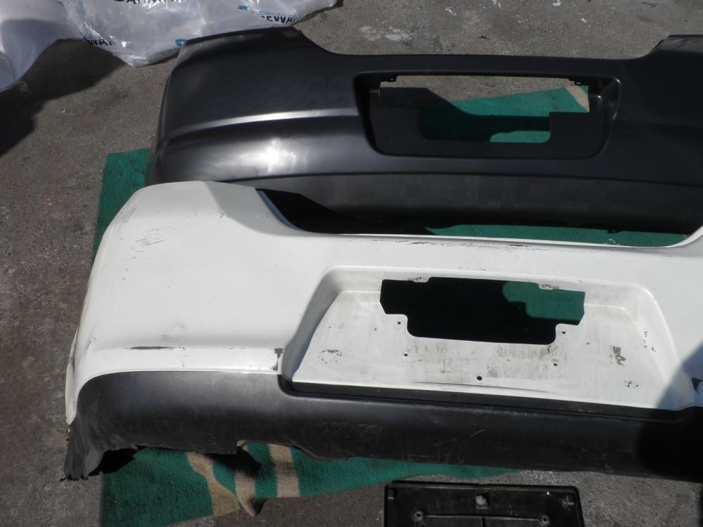 Бампер задній Nissan Tiida C11  2009  Бензин 