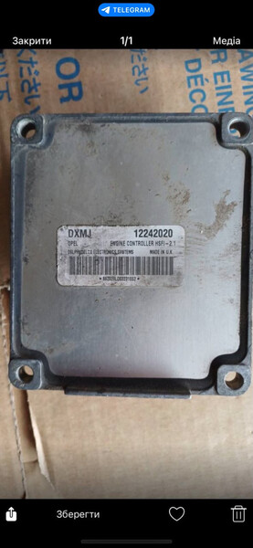 Блок керування двигуном DXMJ12242020   Opel Astra
