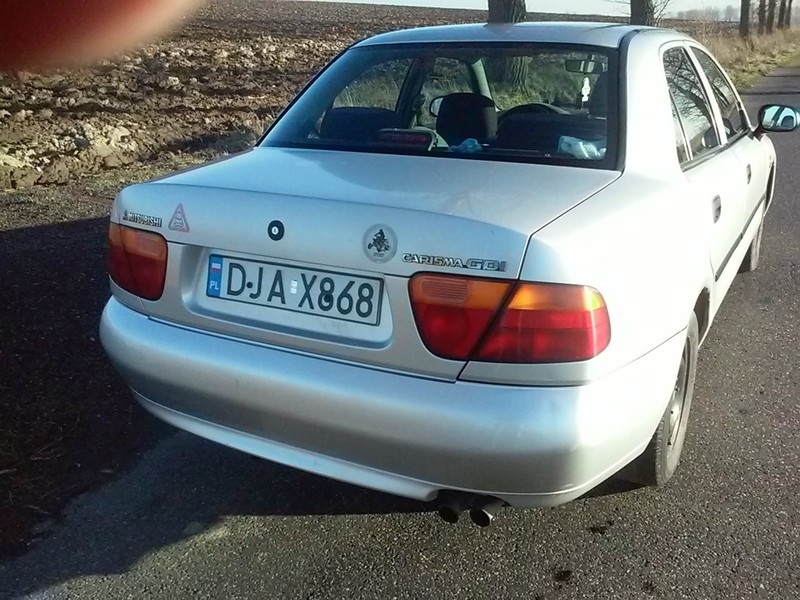 Бампер задній з підсилювачем і 2 фонарі в кришку Mitsubishi Carisma  1997 1.8 Бензин Львов