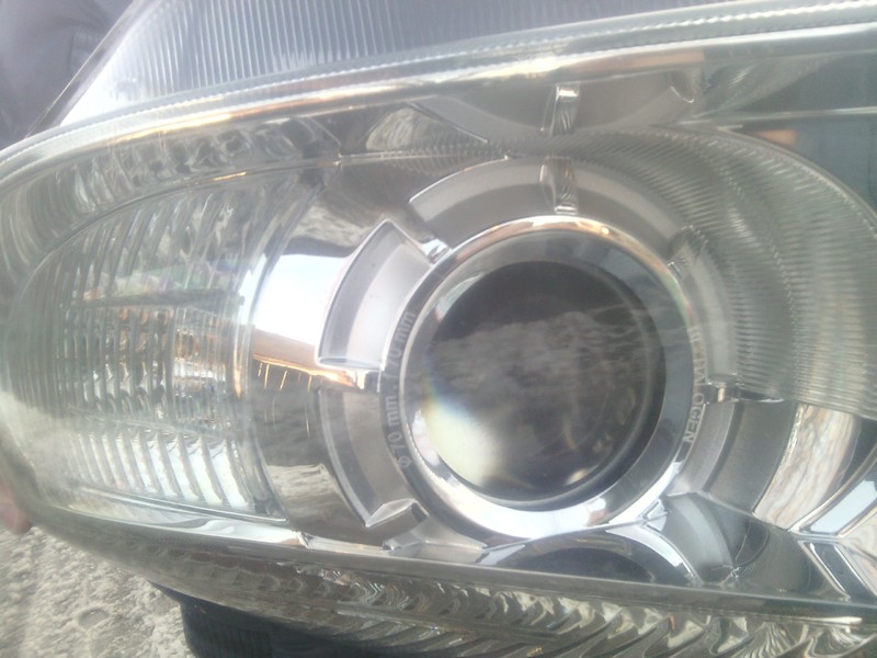 Фара правая 1ED 247 025-221   Skoda Fabia