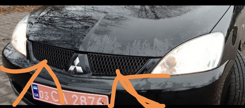 Заглушки решетки радиатора Mitsubishi Lancer  2008 1.6 Бензин Кривой Рог
