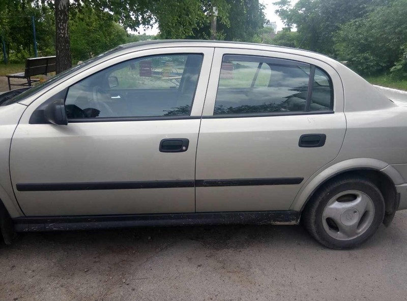 Крило переднє FE821167   Opel Astra