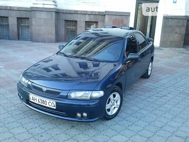 Радиаторная решетка, зеркало правое Mazda 323  1997 1.5 Бензин Полтава