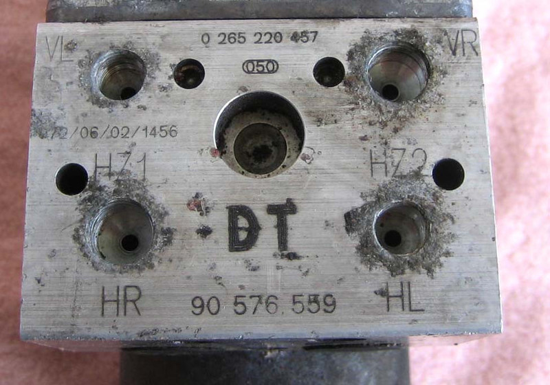 Блок управління ABS 90576559   Opel Vectra