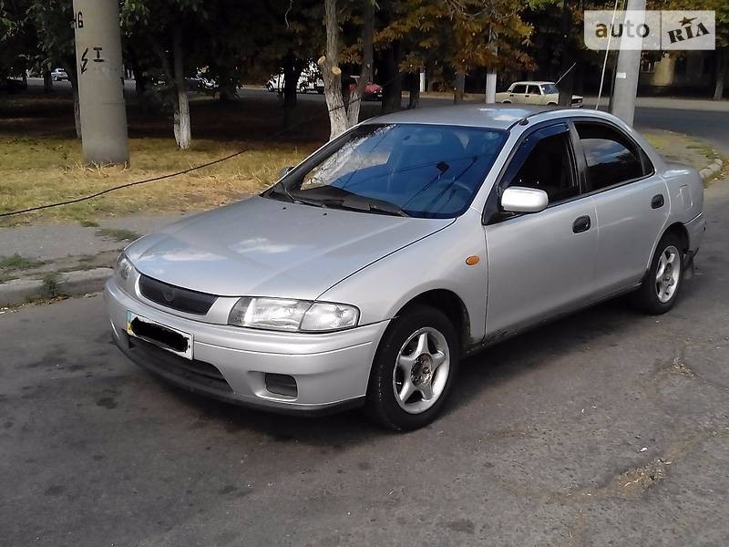 Крыло переднее левое Mazda 323 1998 г.  1.5 л бензин Одесса