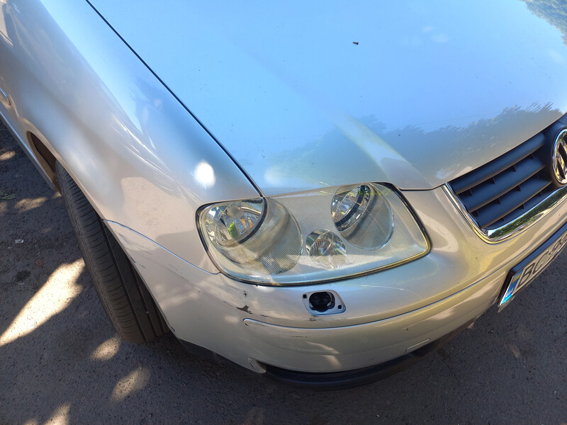 Заглушка форсунки омивача фари права Volkswagen Touran  2005 универсал 1.6 Бензин Червоноград