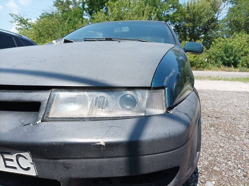 Стекло фары Opel Calibra  1993 купе 2.0 Бензин Запорожье