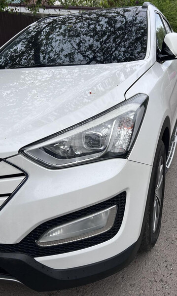 Передня фара 921012W301   Hyundai Santa FE