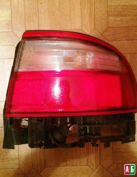 Задний левый фонарь указателя поворота Toyota Carina E  1995 1.6 Бензин 