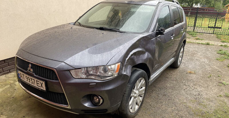 Крыло переднее левое Mitsubishi Outlander XL 2011 г.  2.2 л бензин