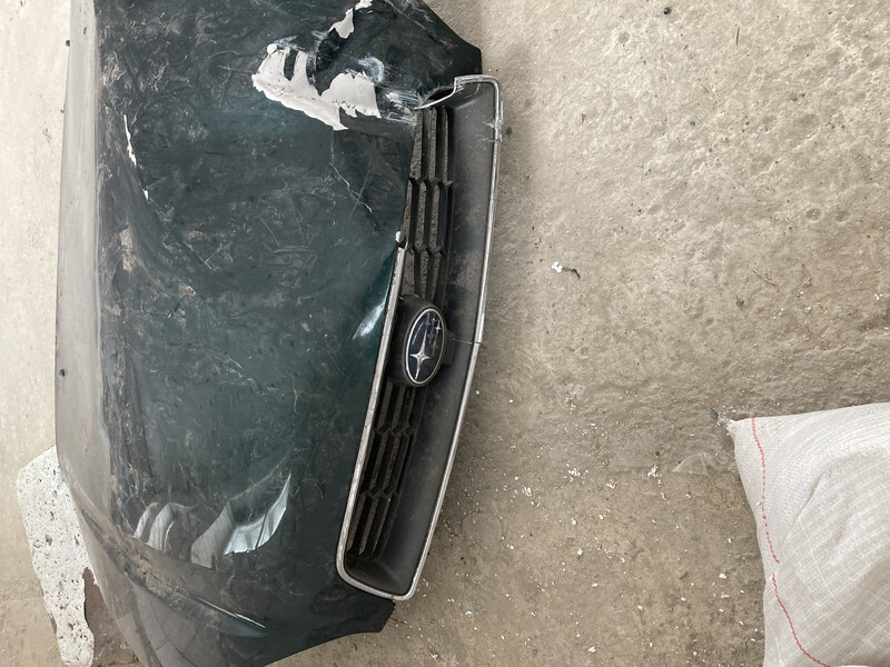 Решетка радиатора 91121-AE310   Subaru Legacy