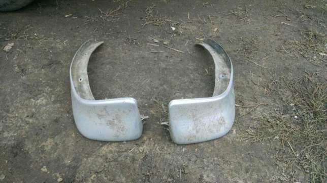 Бризковики задні Mazda 323  1995 хетчбек 1.5 Бензин 